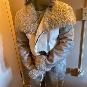 Woman’s shearling coat by laundry